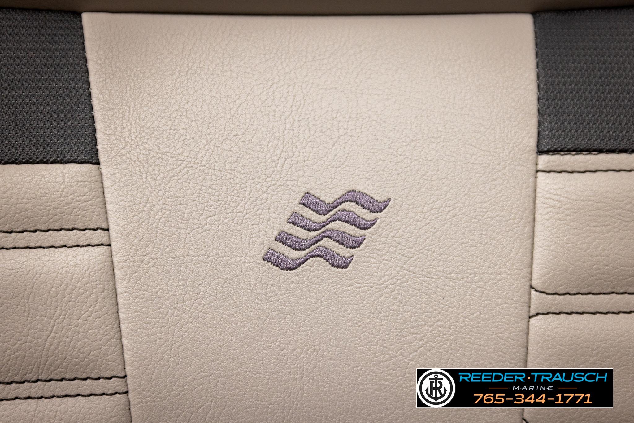 2024 FOURWINNS HD5 Surf boat seat with embroidered wave logo and Reeder Trausch Marine contact.
