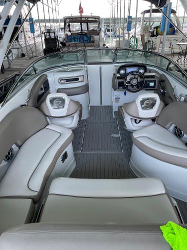 2019 Crownline E255 boat interior with plush seating and modern dashboard.