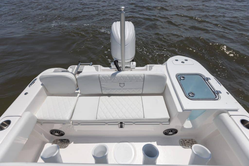 Manufacturer Provided Image: 2025 Sea Fox 228 Commander boat interior with seating and storage on water.