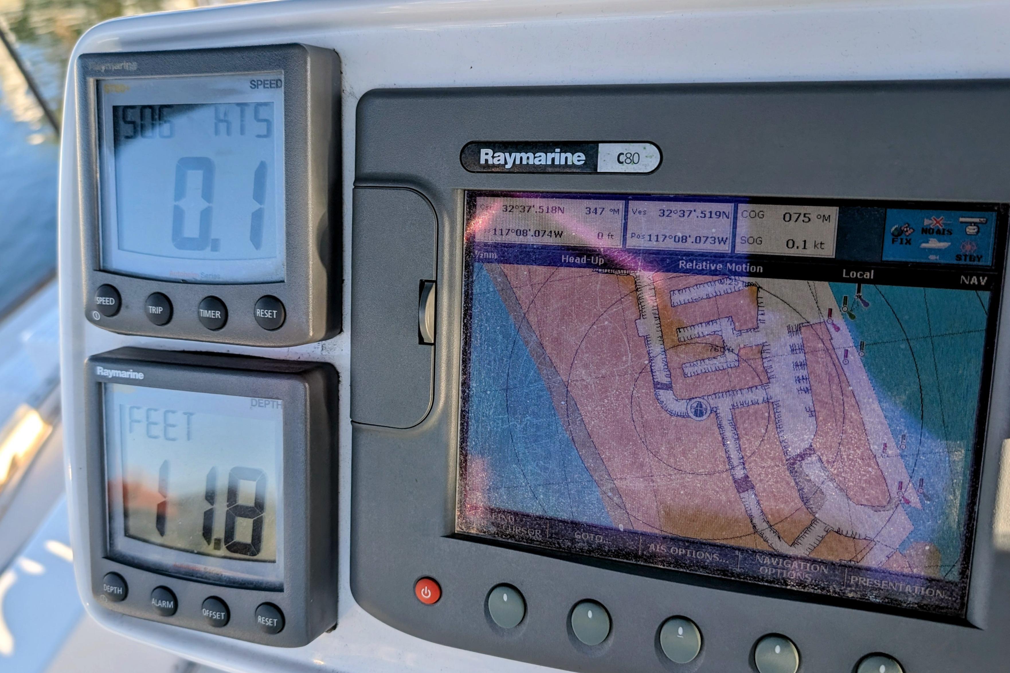 Navigation instruments on a 1989 Catalina 34 sailboat, displaying speed, depth, and map.