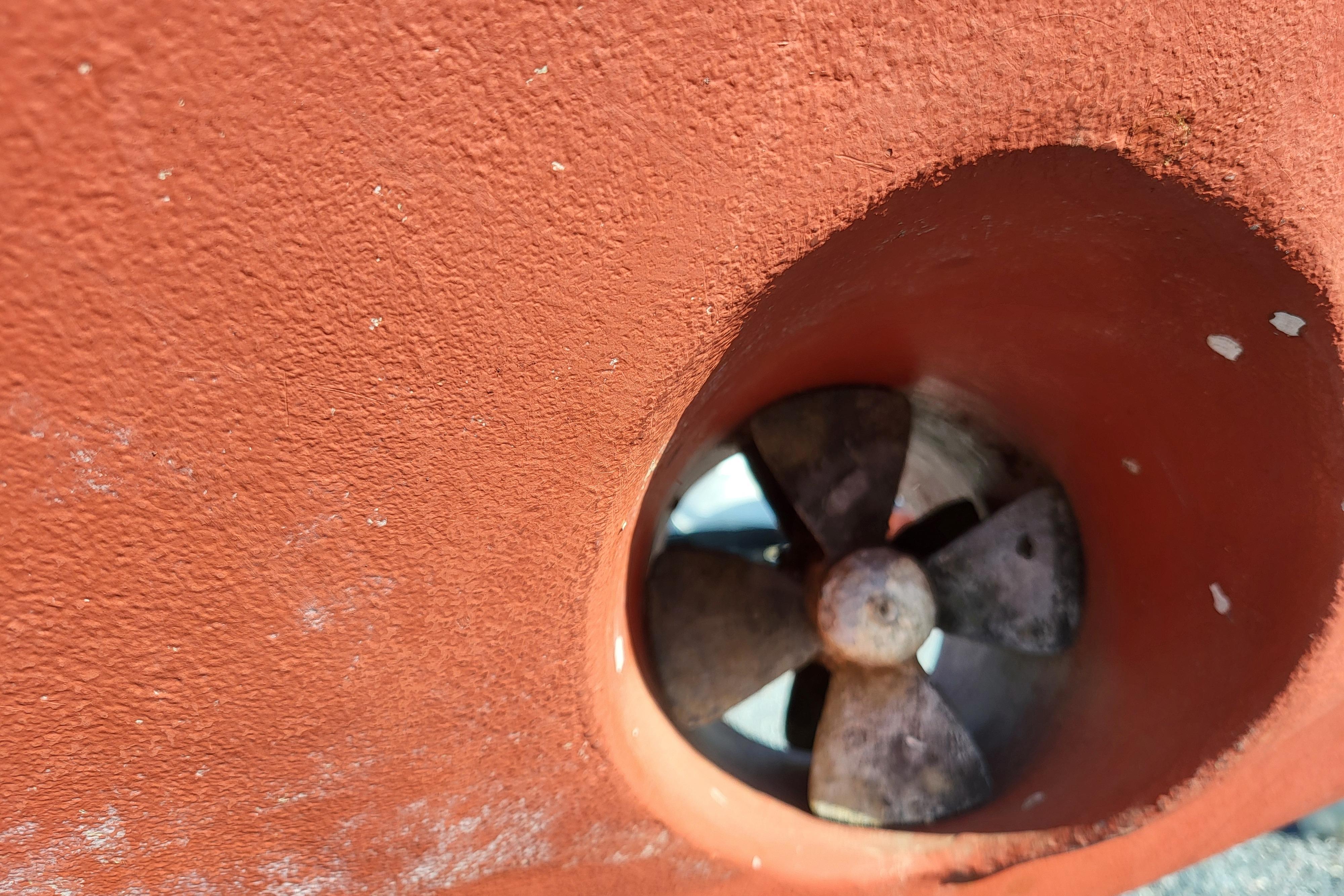 Close-up of a 2000 Island Packet 420 boat's bow thruster propeller.