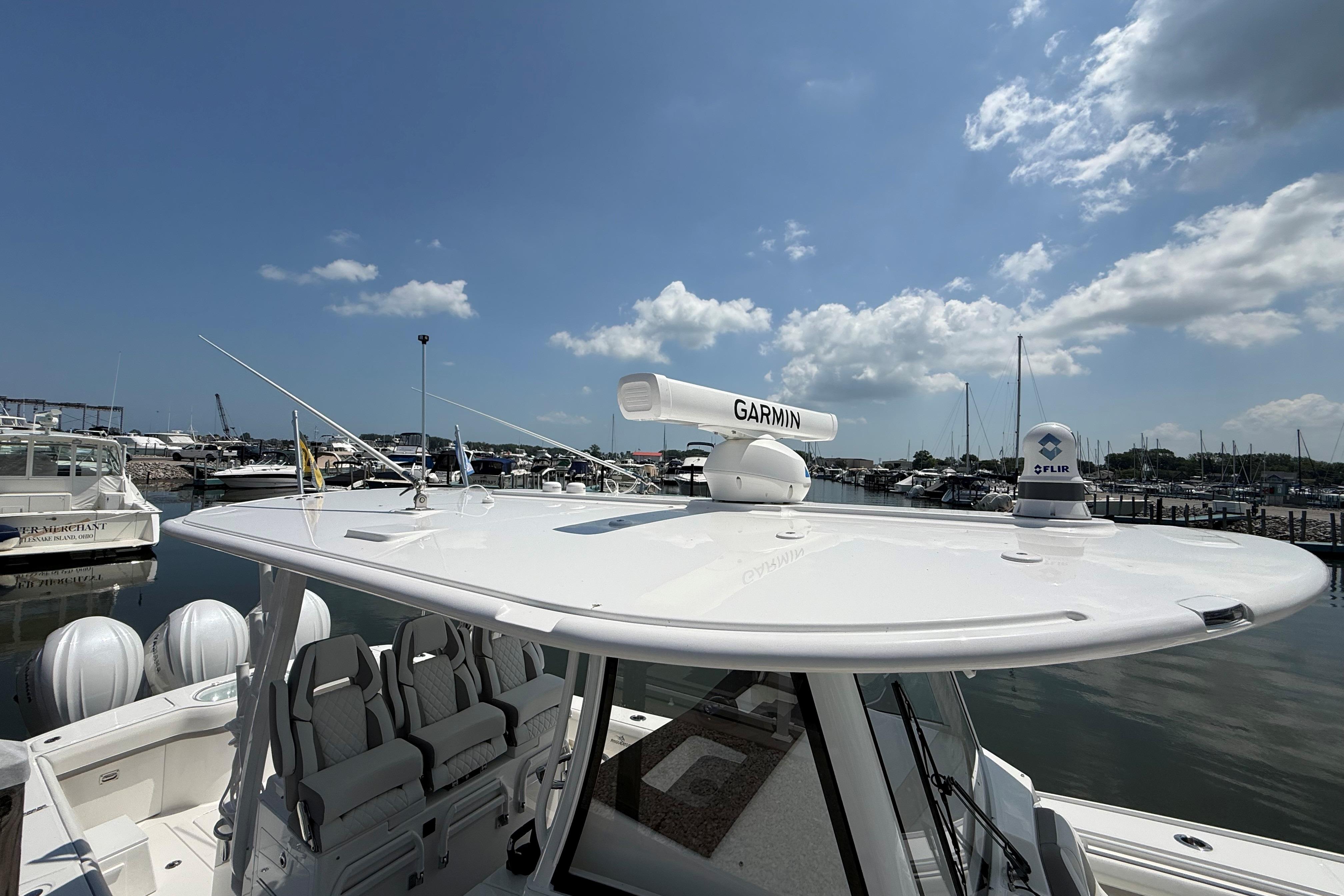 2026 Regulator 35 boat with Garmin and FLIR equipment docked at a marina.