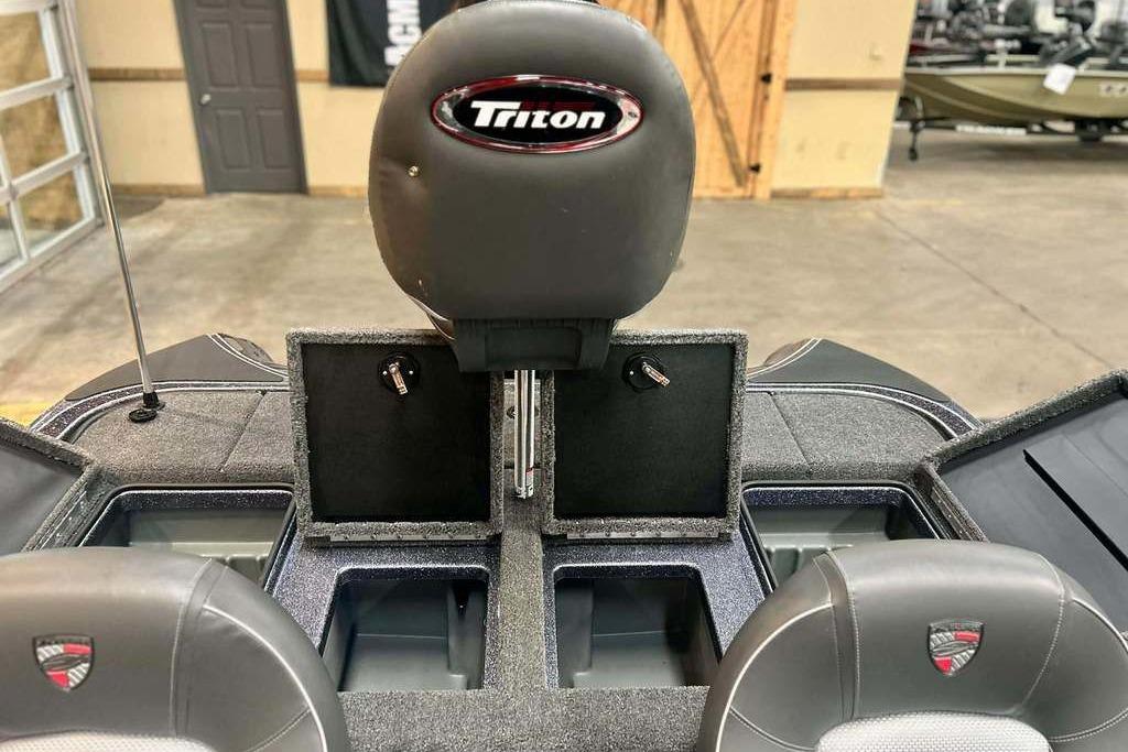 2026 Triton 18 TrX boat interior with storage compartments and seating.