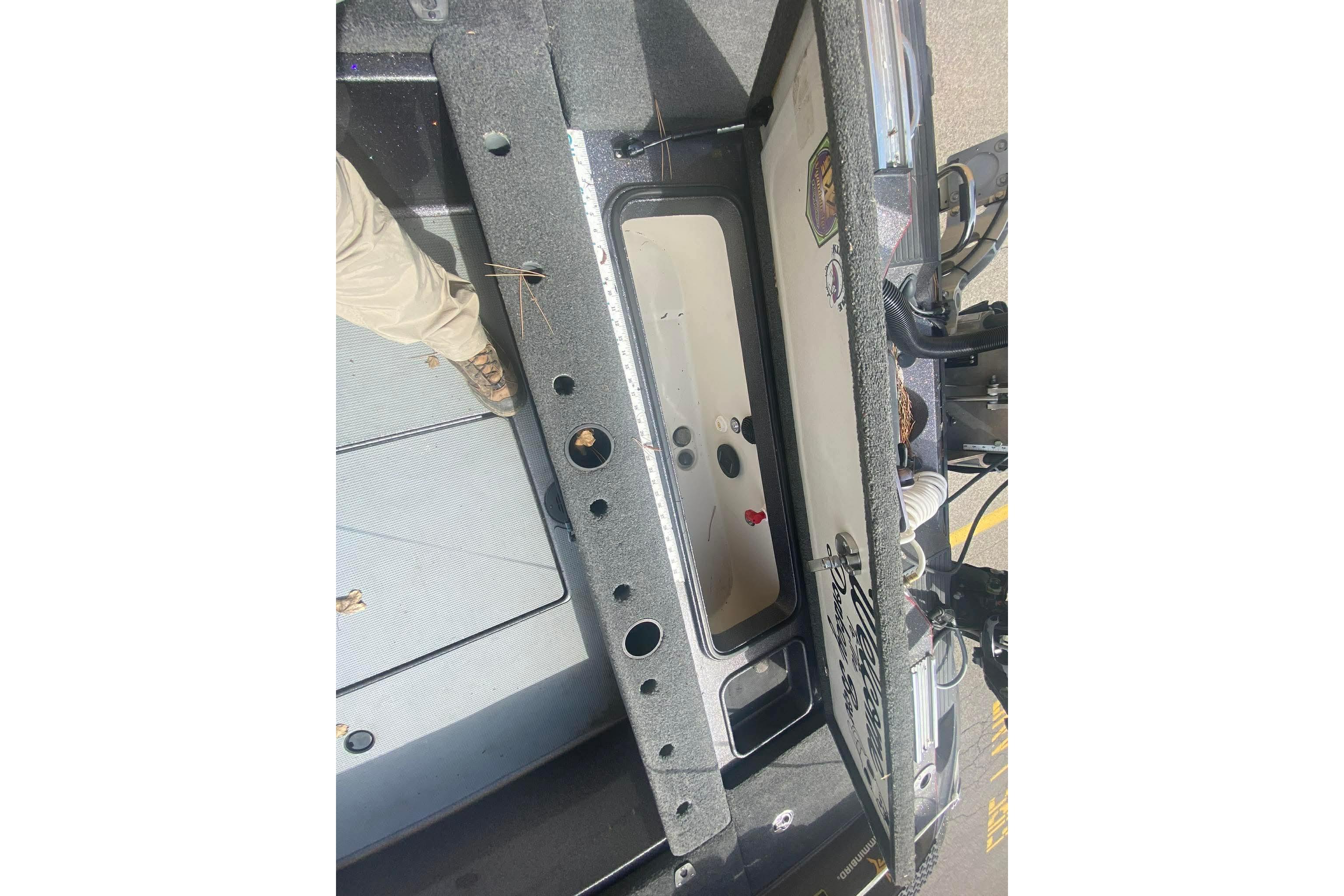 2017 Ranger 621FS Fisherman boat interior with open storage compartment.