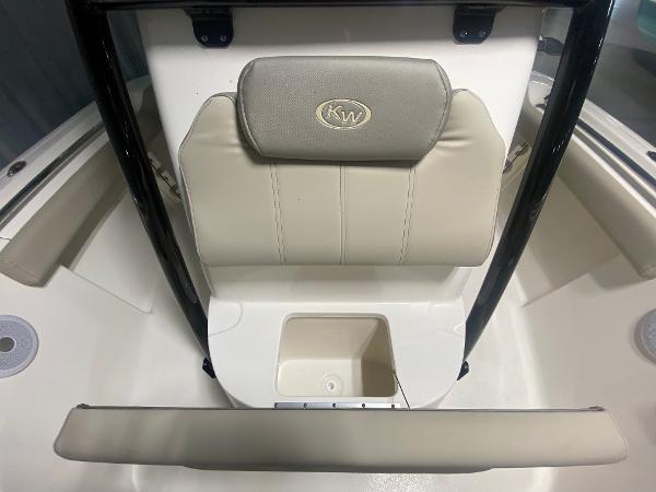 2024 Key West 219 FS boat interior seating and storage compartment.