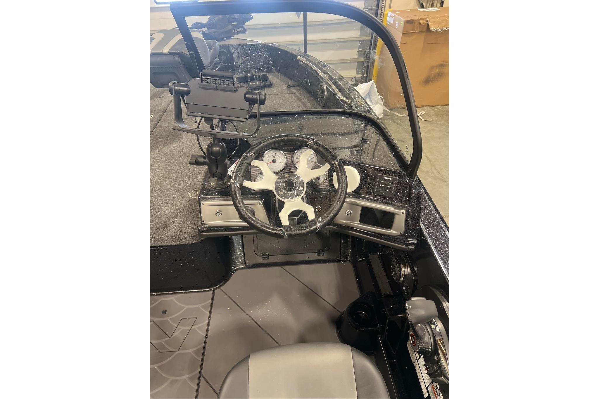 Steering console of 2026 Nitro ZV20 Pro boat with modern controls and dashboard.