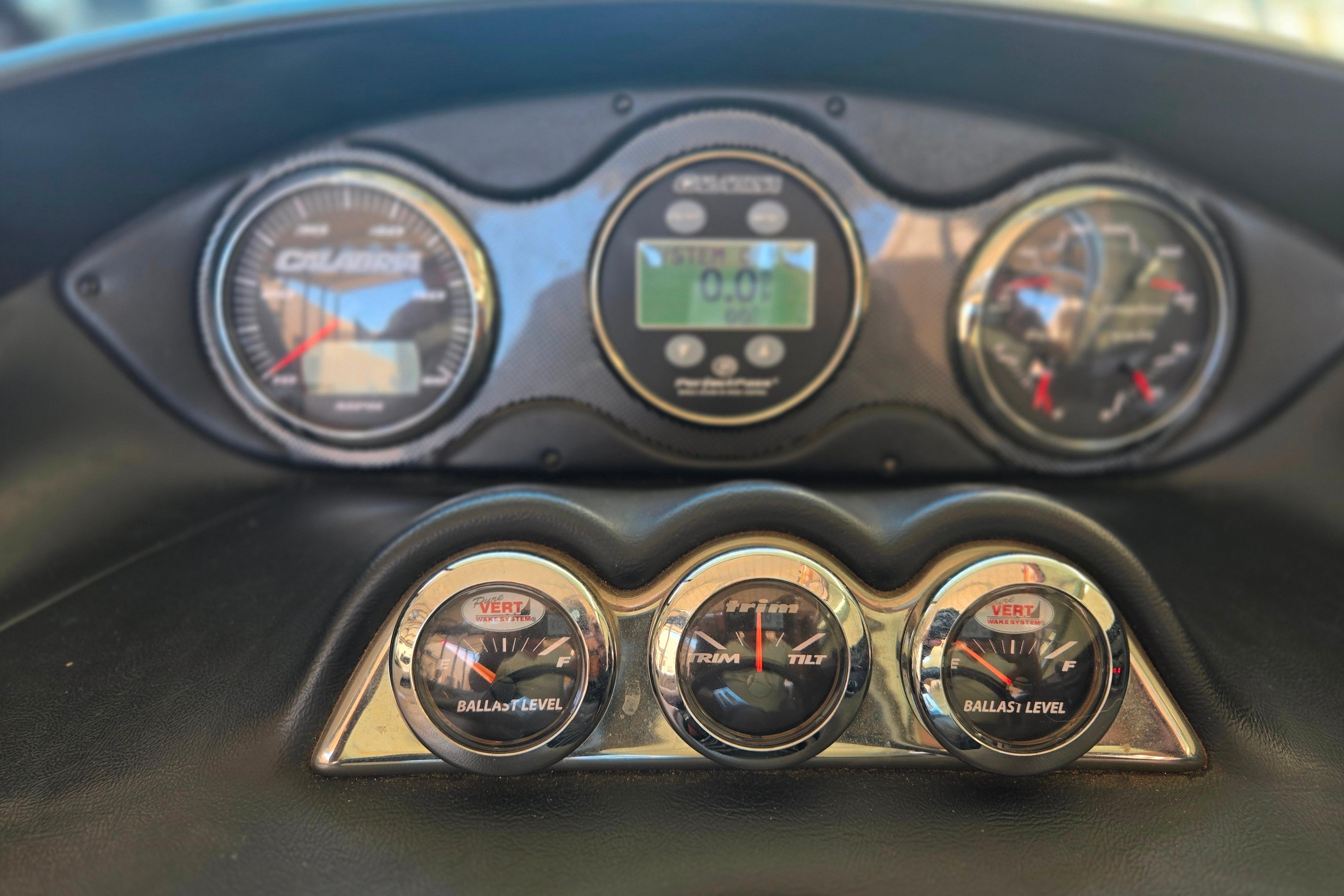 Dashboard of a 2007 Calabria CAL AIR PRO V boat with gauges and controls.