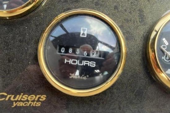 Hour meter of 2004 Cruisers Yachts 3372 Express showing 8369 hours.