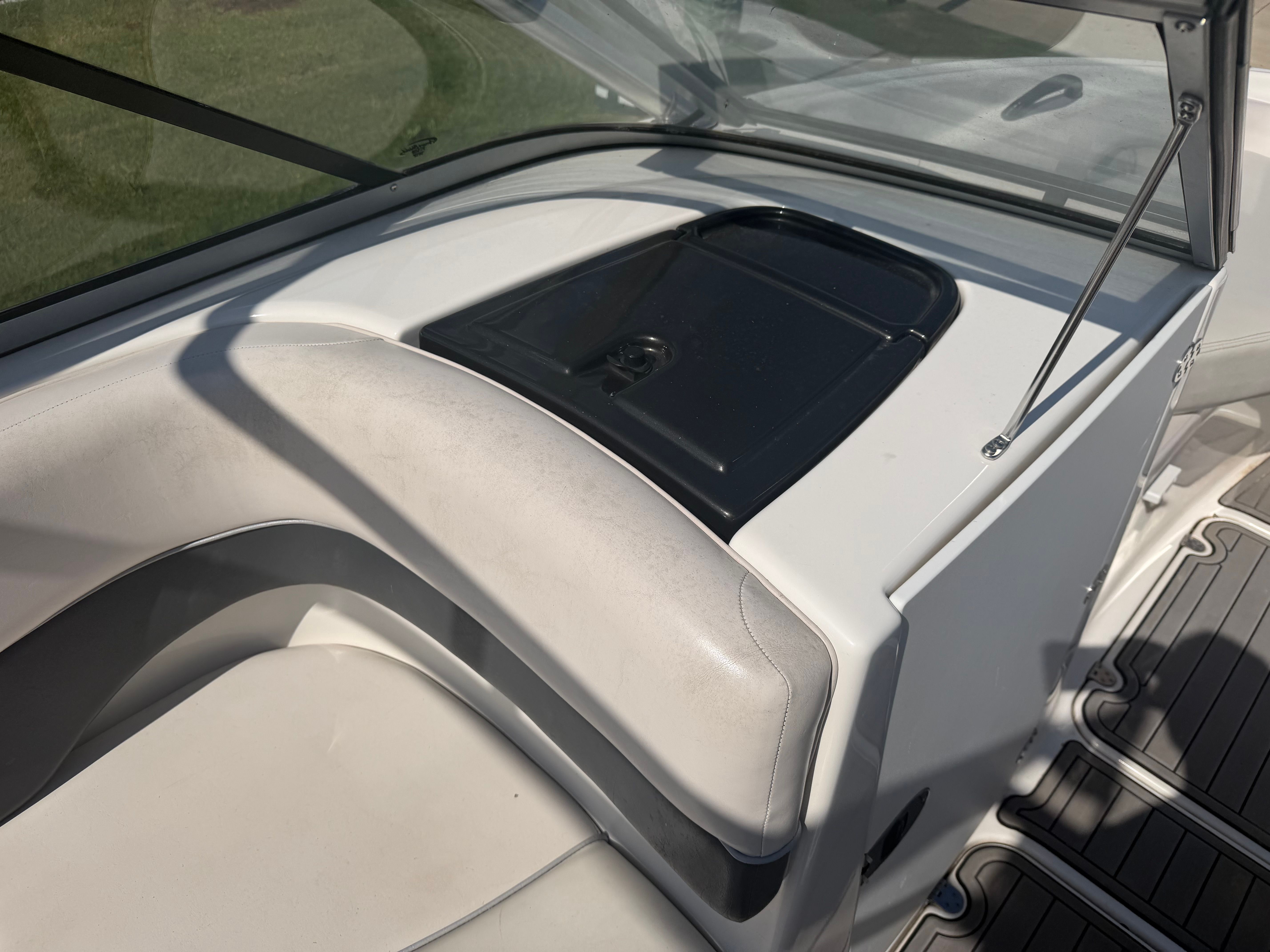 2006 Yamaha AR210 boat interior with seat and dashboard.