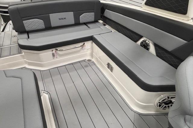 2026 Chaparral SSX 8 boat interior with gray seating and sleek design.