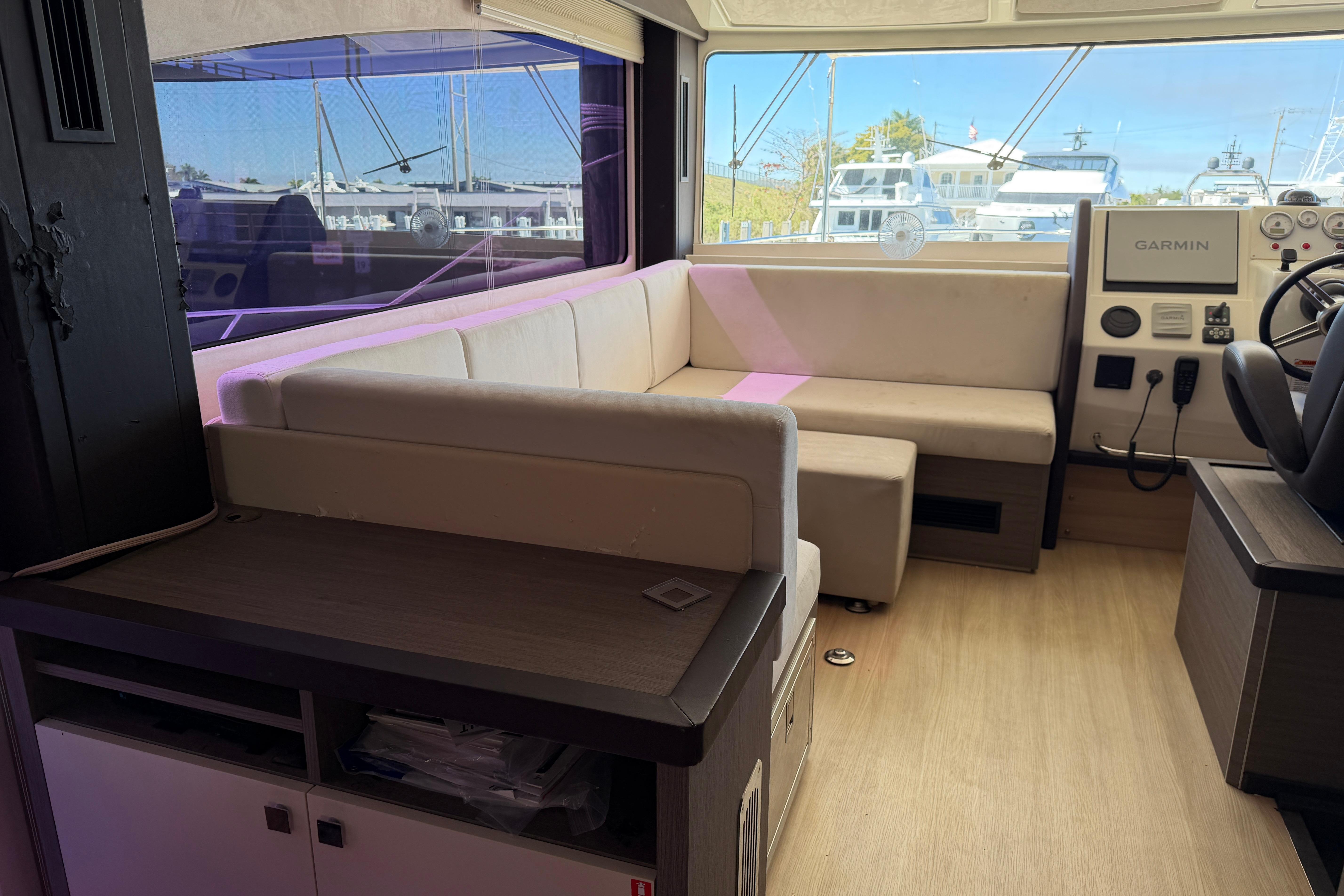 Interior of 2016 Cranchi Eco Trawler 53 Long Distance with seating and navigation equipment.