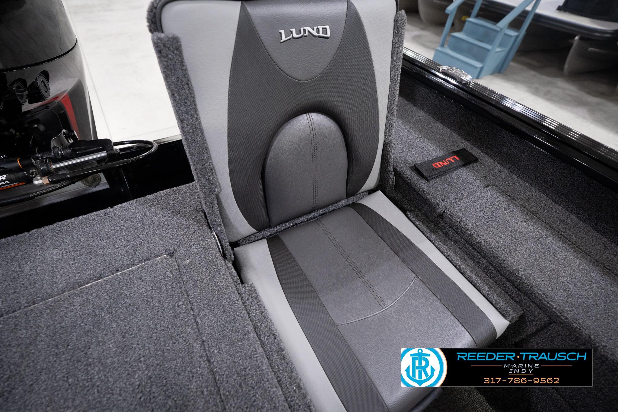 2026 Lund 1775 Impact XS SS boat seat with gray upholstery and branding details.