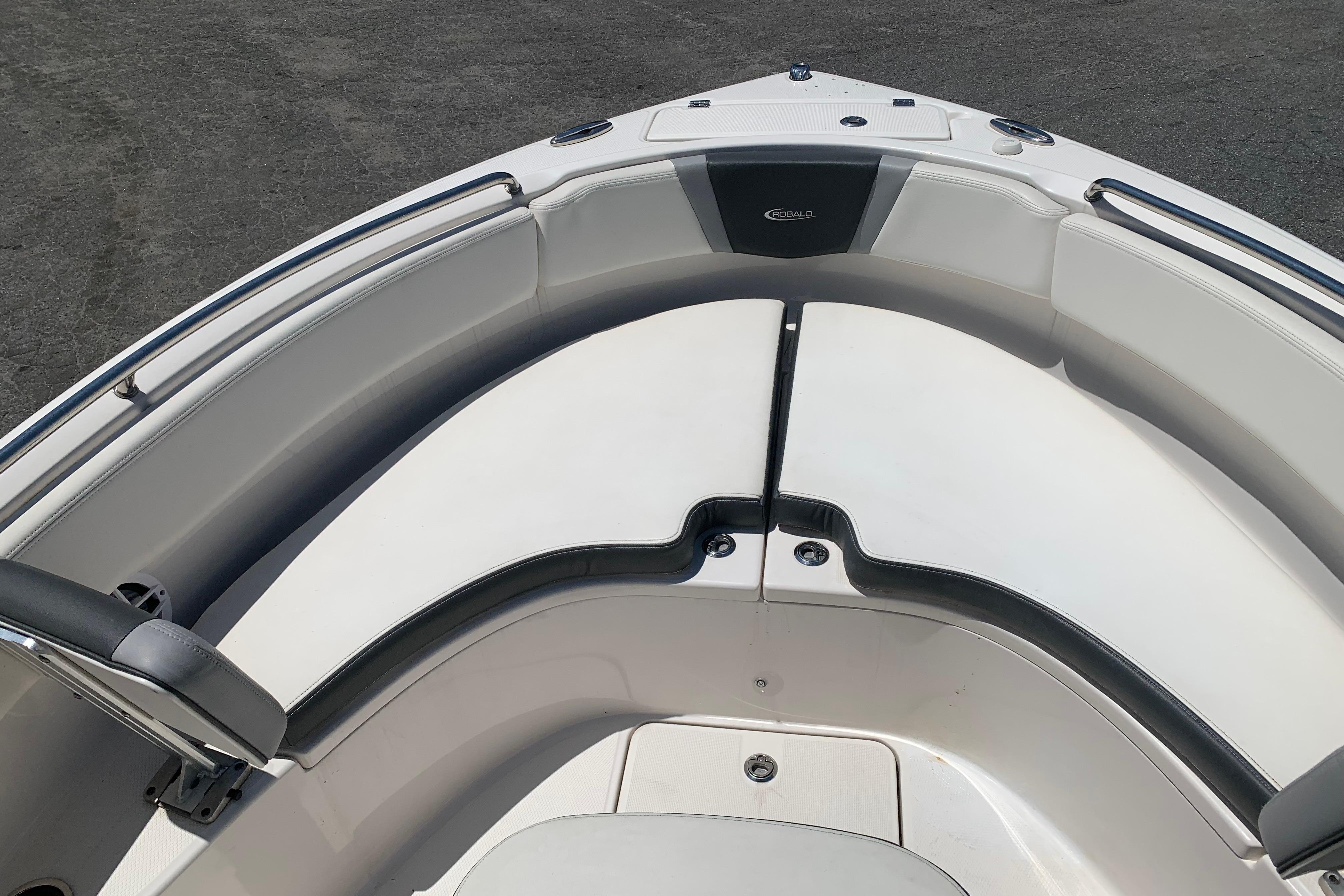 2023 Robalo R222 Center Console boat interior with cushioned seating and sleek design.