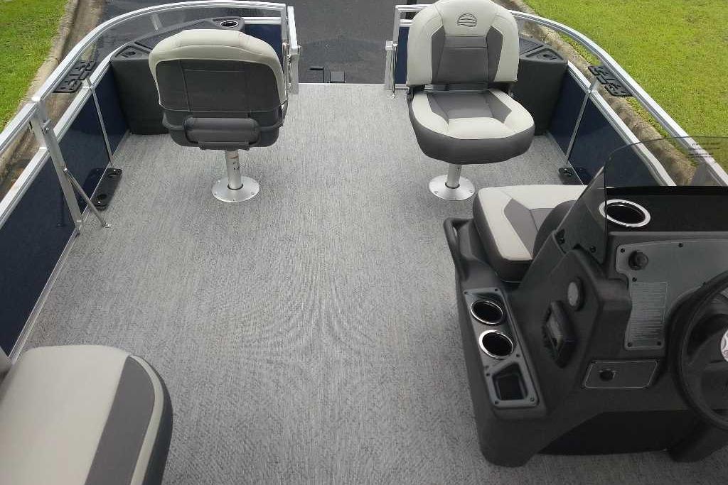 2026 Sun Tracker Bass Buggy 18 DLX pontoon boat interior with seating and console.