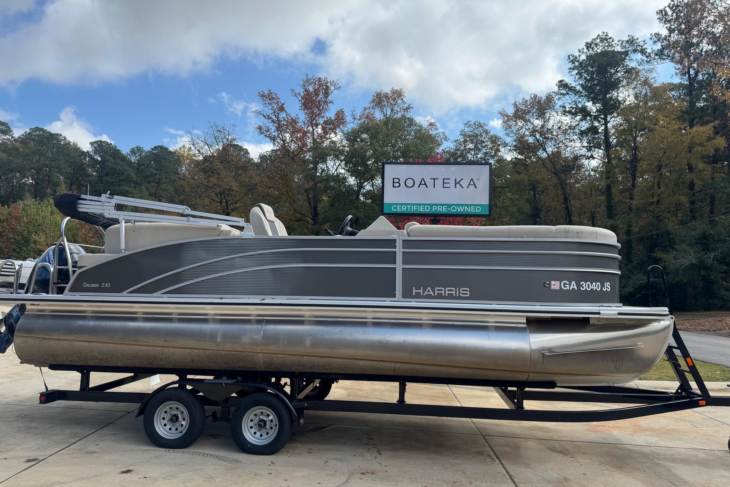 2023 Harris Cruiser 230 pontoon boat on trailer, certified pre-owned by Boateka.