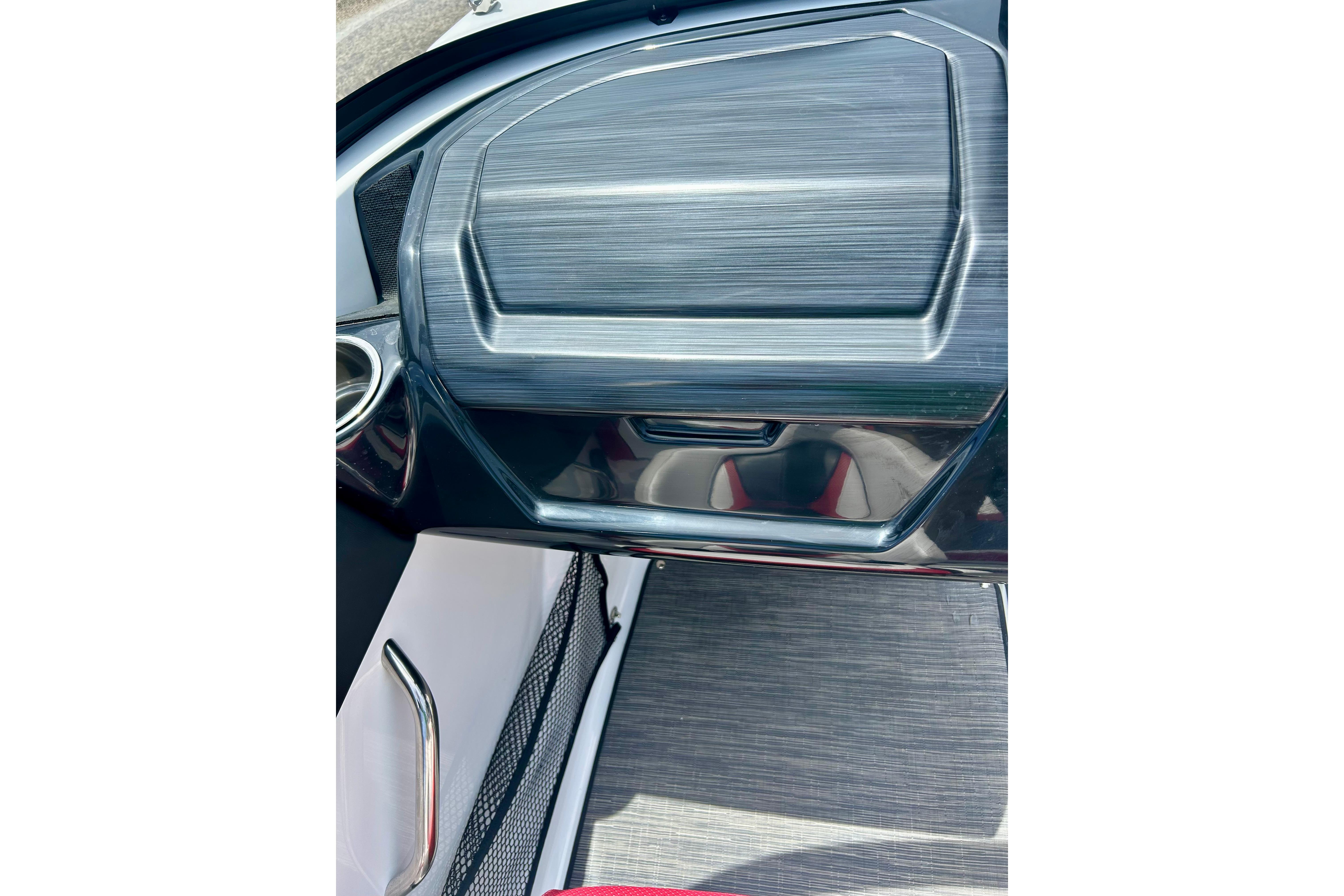 2021 Scarab 195 ID boat interior with sleek dashboard design and modern finishes.