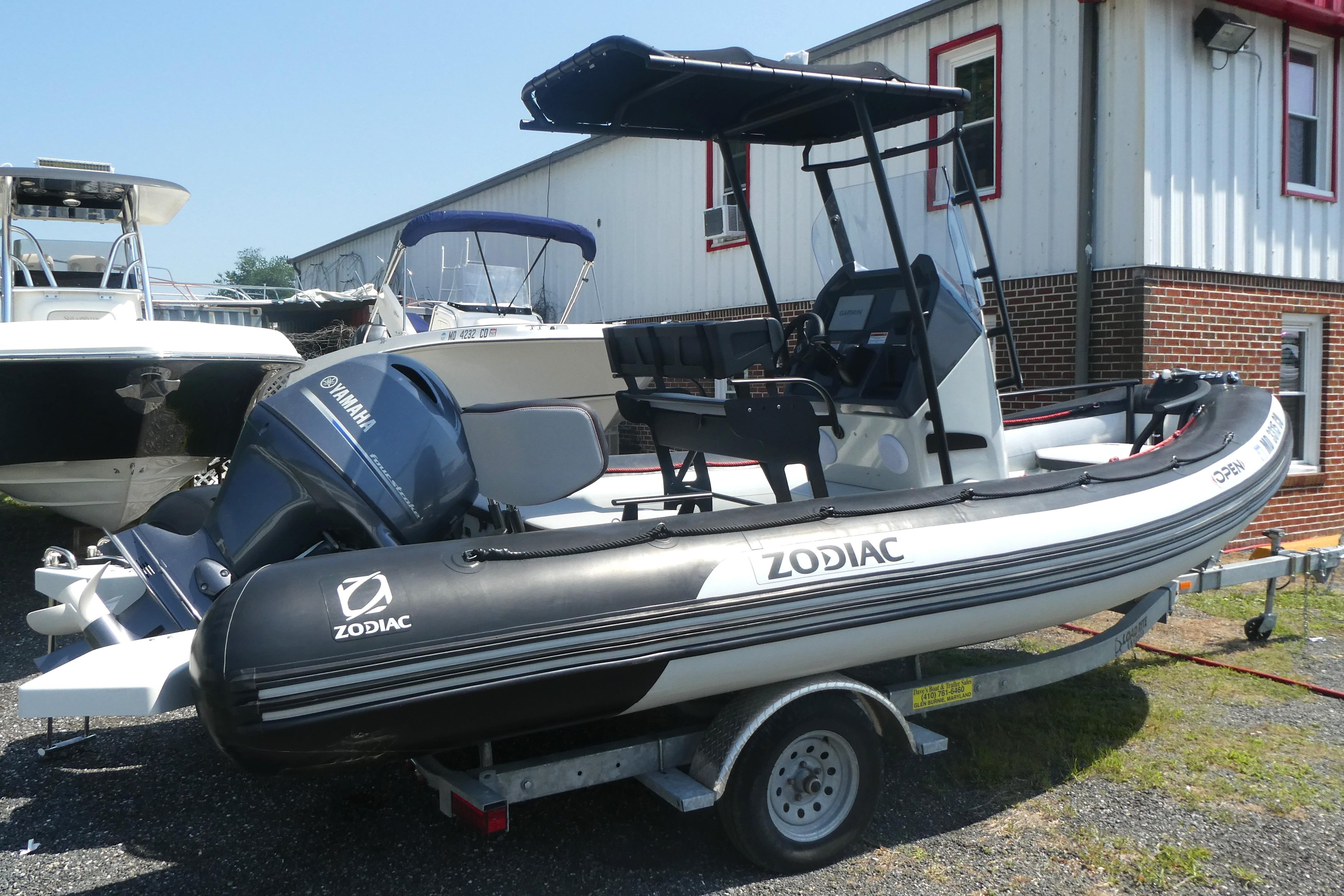 2022 Zodiac Pro 5.5 inflatable boat with Yamaha engine on trailer.