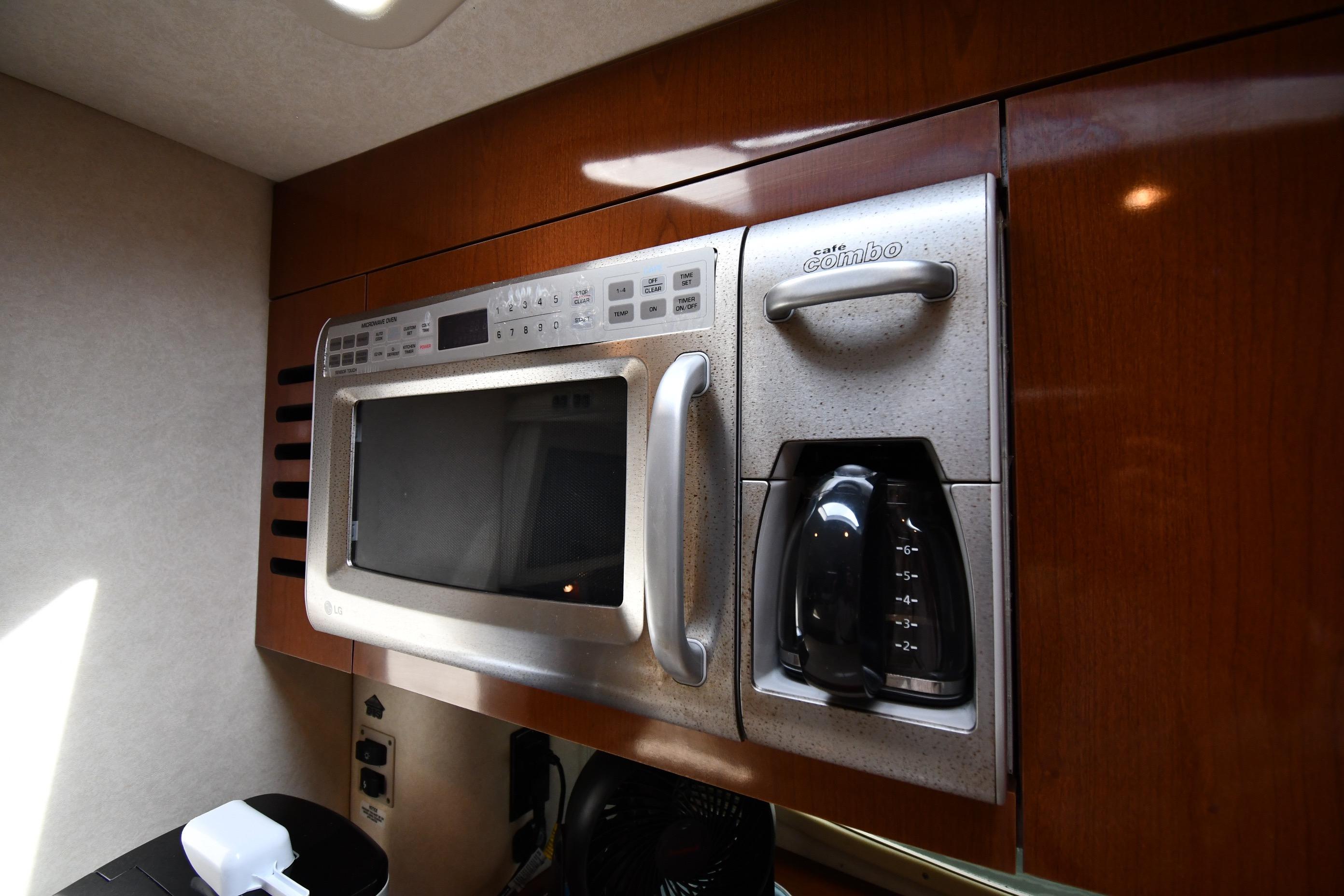 Microwave and coffee maker in 2008 Sea Ray Sundancer 350 yacht kitchen.