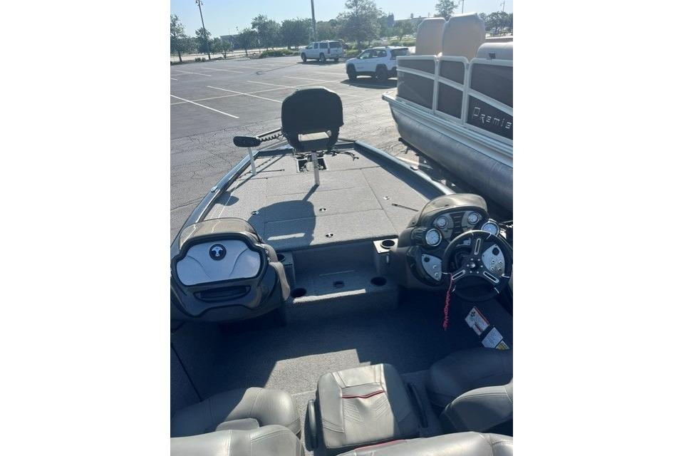 2023 Tracker Pro Team 195 TXW Tournament Edition boat interior with steering console and seating.