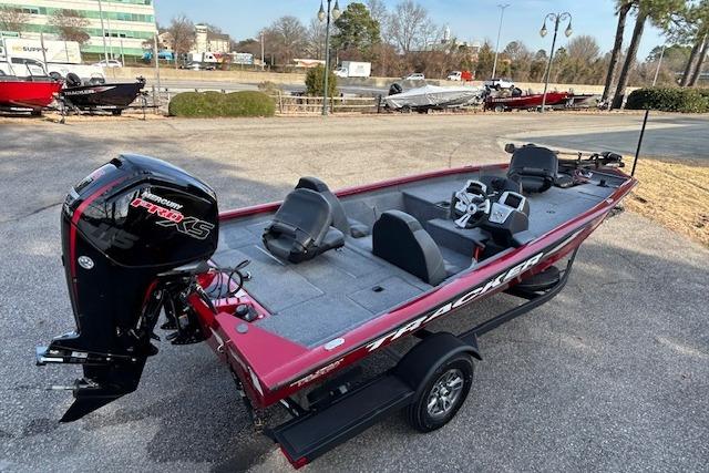 2025 Tracker Pro Team 190 boat with Mercury engine, parked outdoors on a trailer.