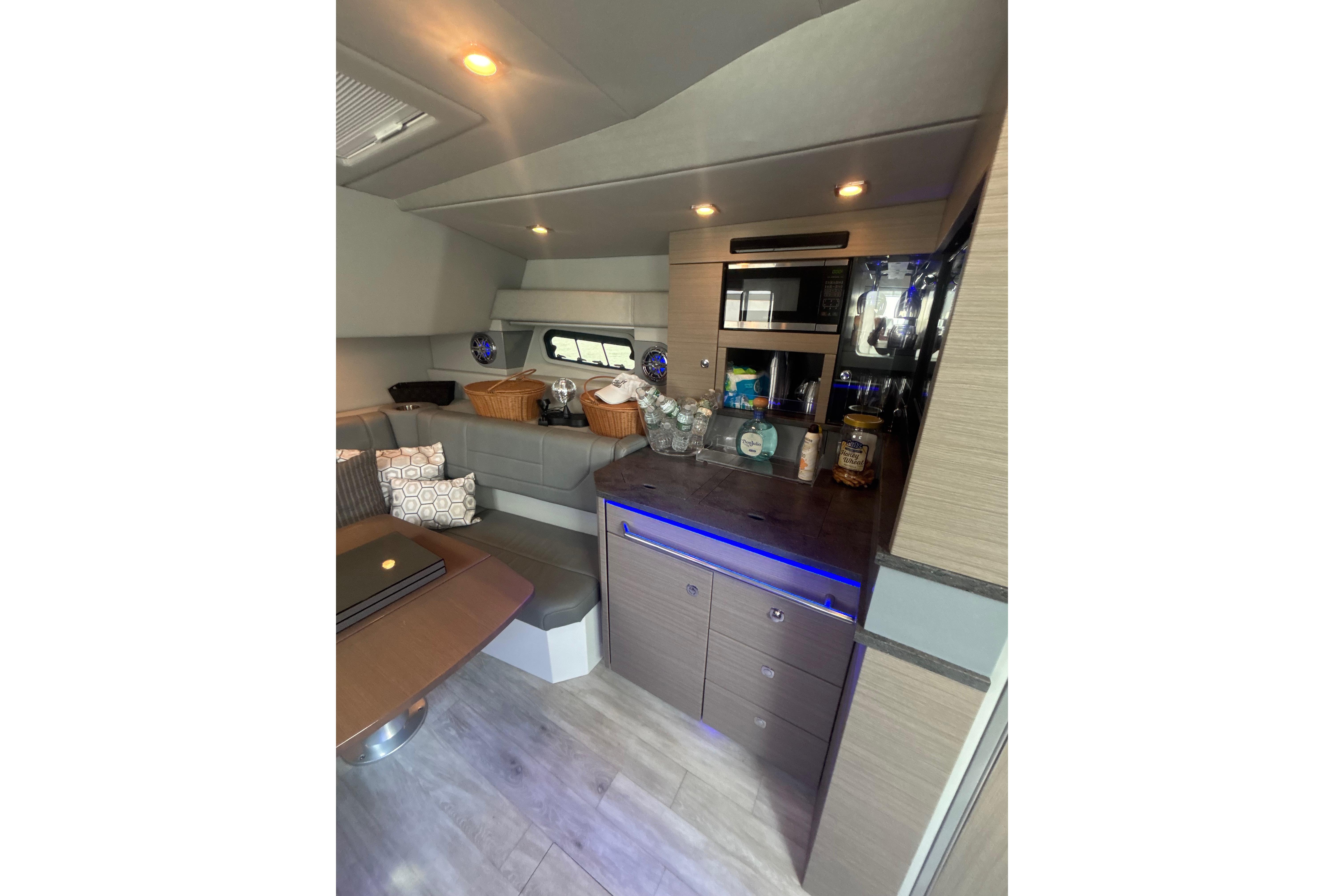 Luxurious interior of 2019 Formula 430 Super Sport Crossover with modern amenities and seating.