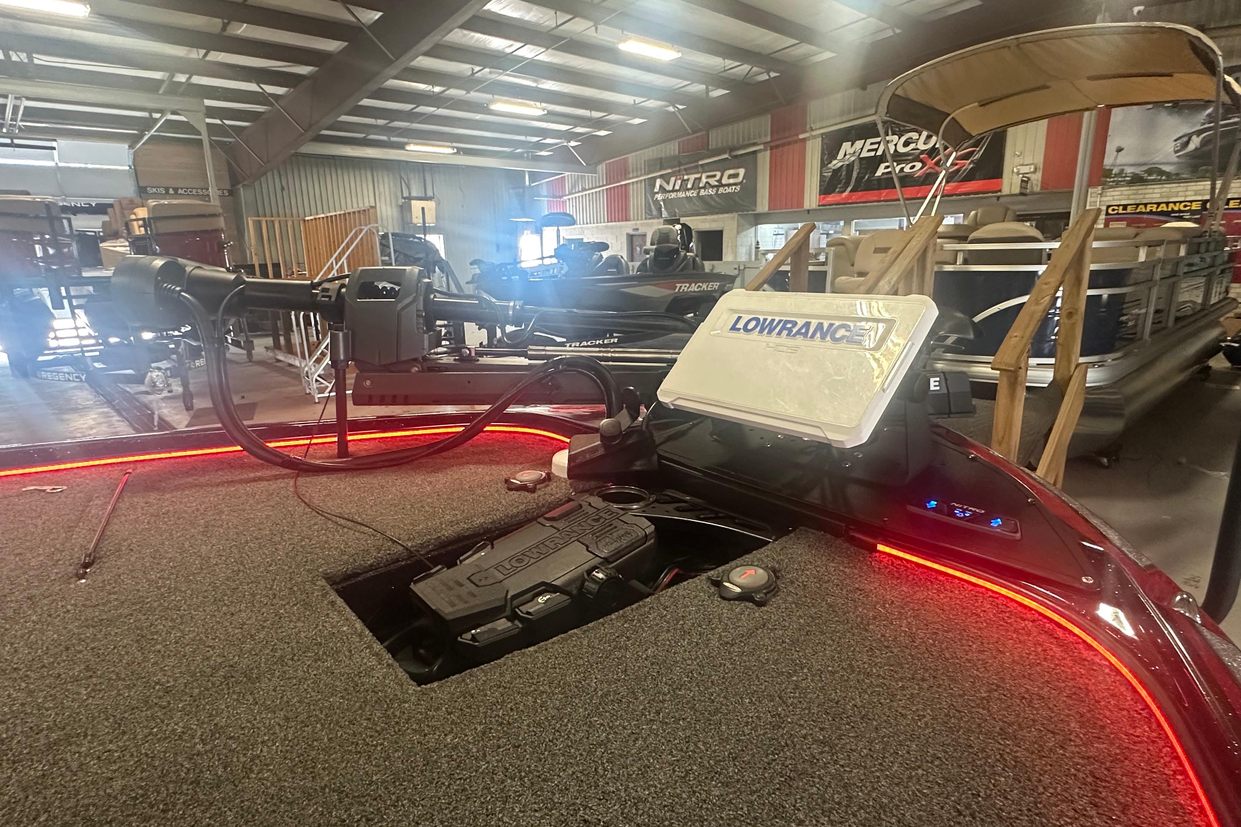 Interior of a 2022 Nitro Z20 Pro boat with Lowrance electronics and red LED lighting.