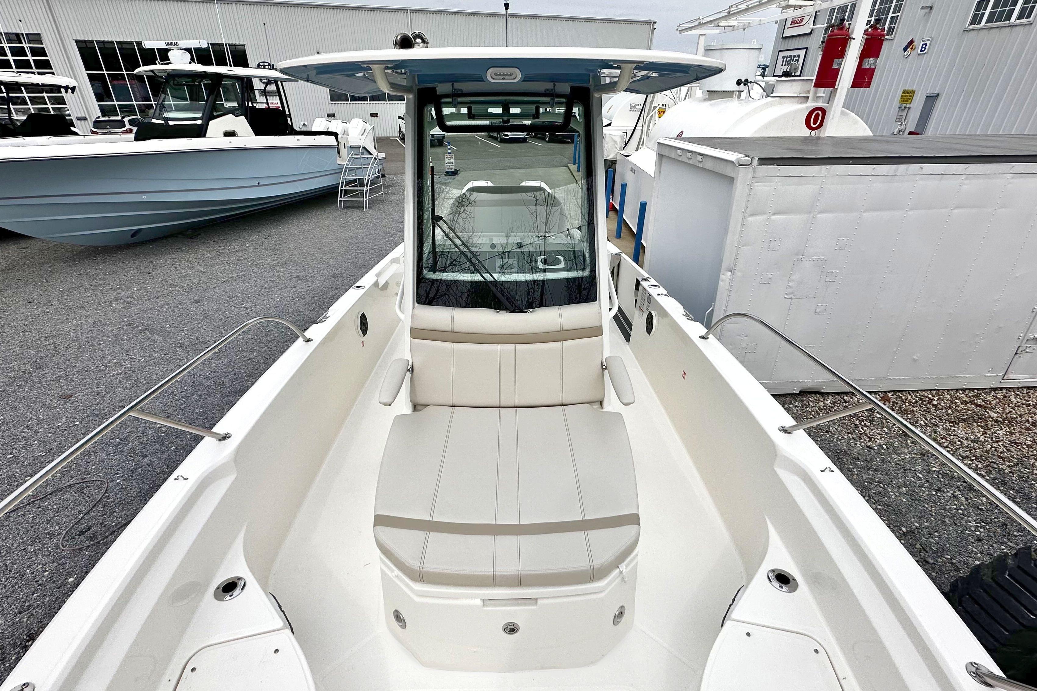 2026 Boston Whaler 280 Dauntless boat, featuring spacious seating and sleek design.