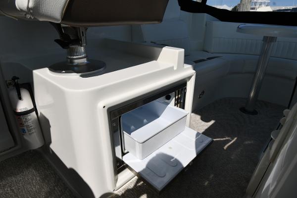 2010 Cruisers Yachts 390 Sports Coupe interior with open storage compartment.