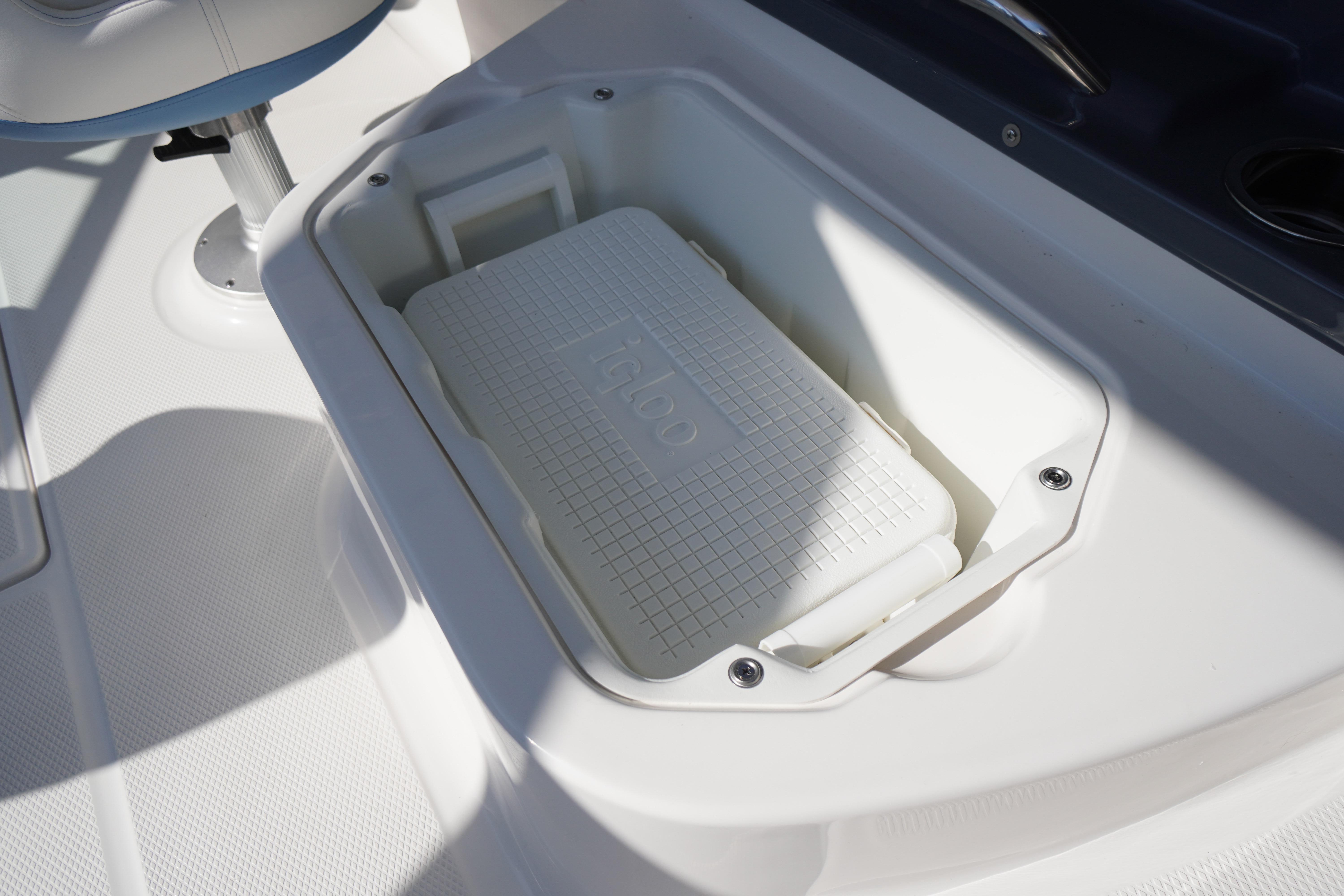 Built-in cooler compartment on 2026 Chaparral 270 OSX boat deck.