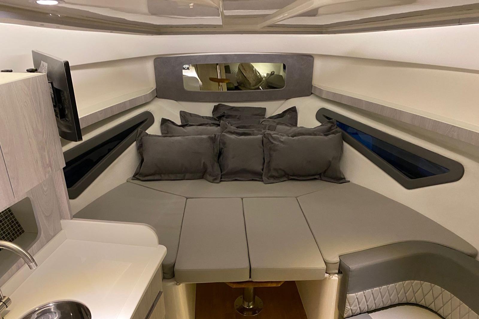 Luxurious interior of 2026 Hanover 375 boat with plush seating and modern amenities.