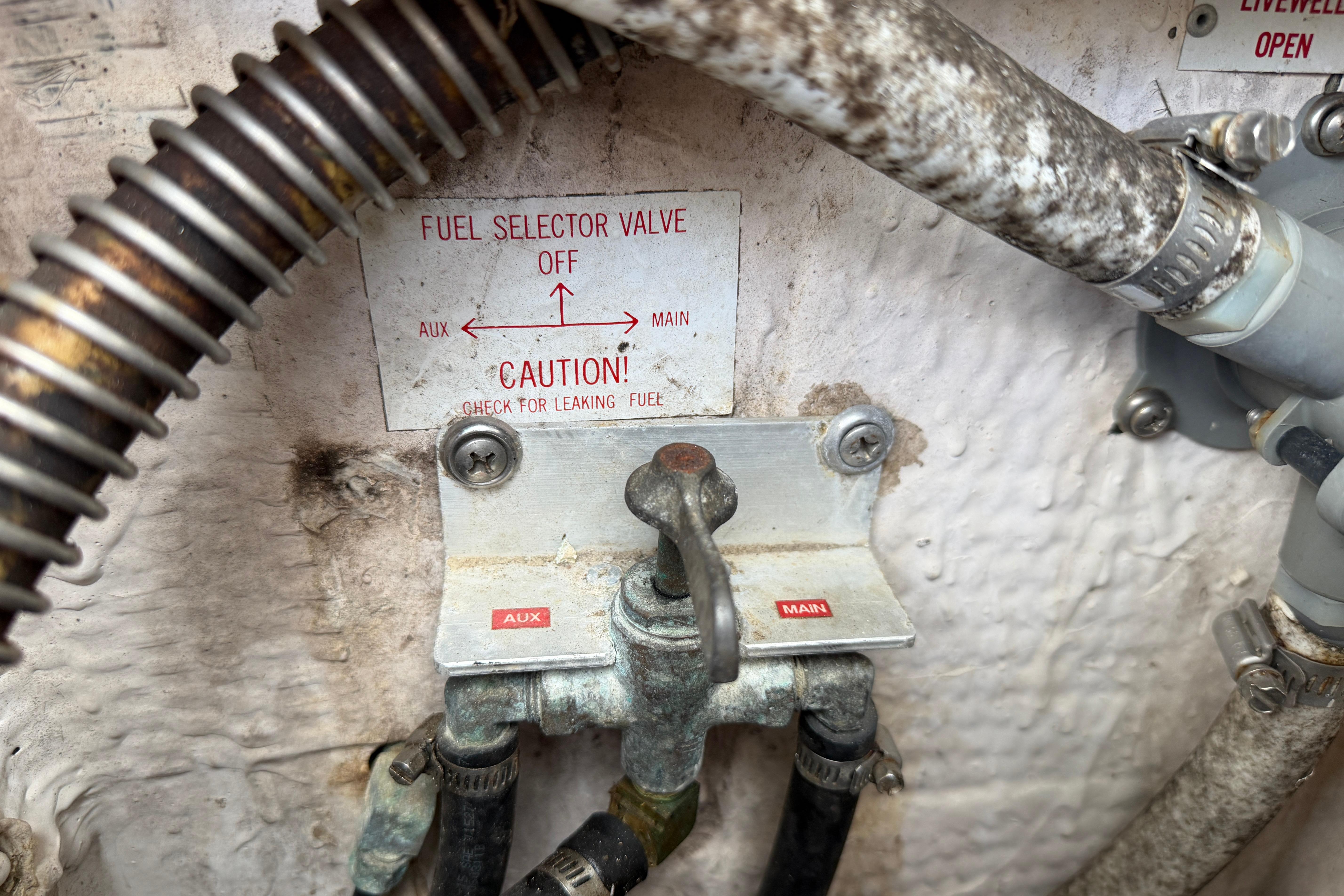 Fuel selector valve on 1987 Grady-White Seafarer 226, showing auxiliary and main options.