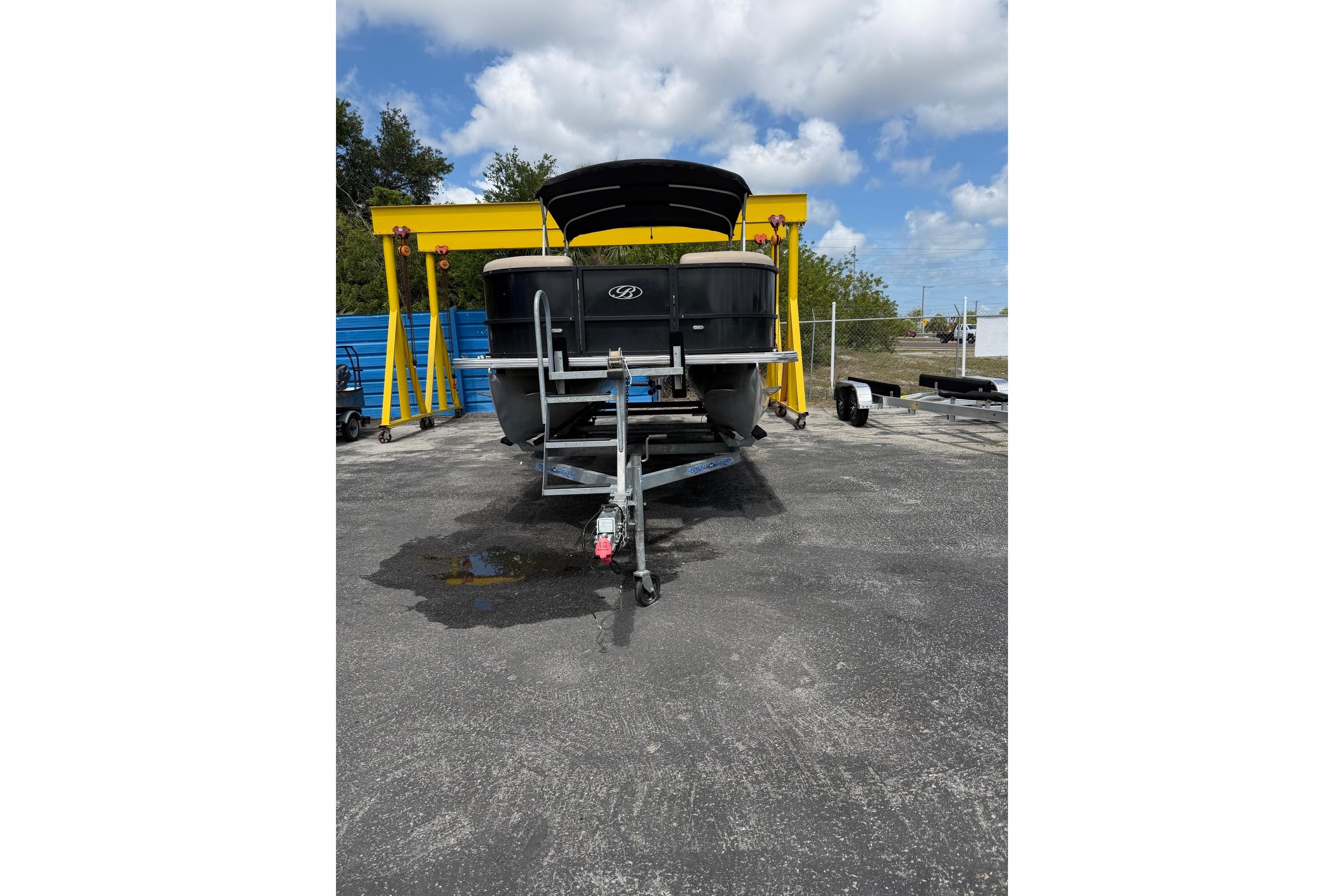 2022 Bentley Pontoons 240 CRUISE on trailer, parked outdoors under a cloudy sky.