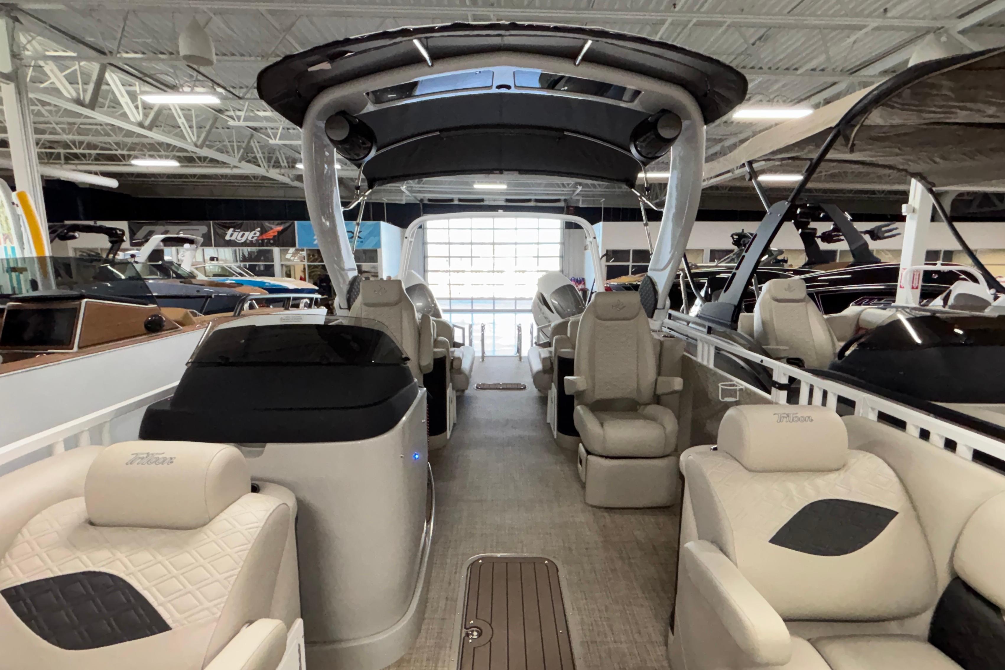 2026 JC Sporttoon 26TT pontoon boat interior with luxurious seating and modern design.