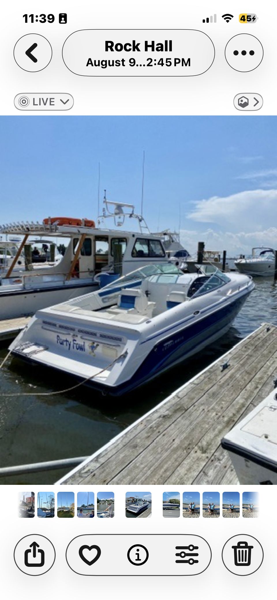 A 1993 Chaparral 2550 SX docked. It's an open motorboat.