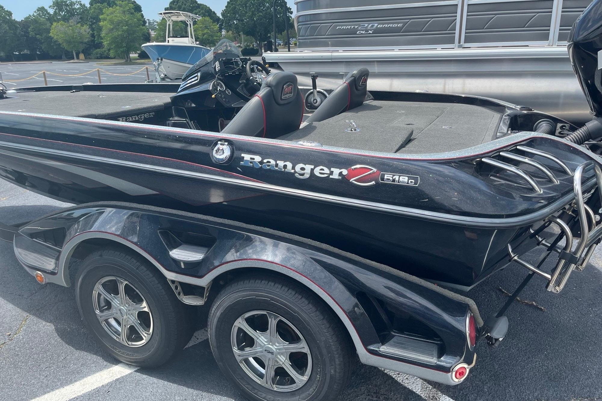 2017 Ranger Z518 Cup-Equipped boat on trailer, parked outdoors.
