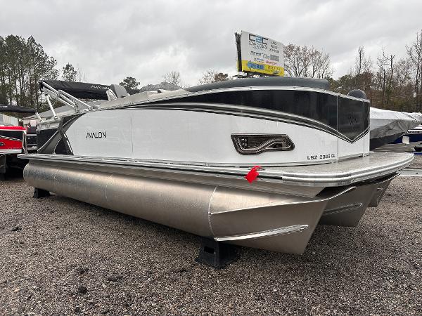 2025 Avalon LSZ Quad Lounger pontoon boat on display, featuring sleek design and modern amenities.
