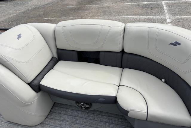 Luxurious seating on a 2021 Starcraft SLS 3 boat, featuring plush white and gray upholstery.