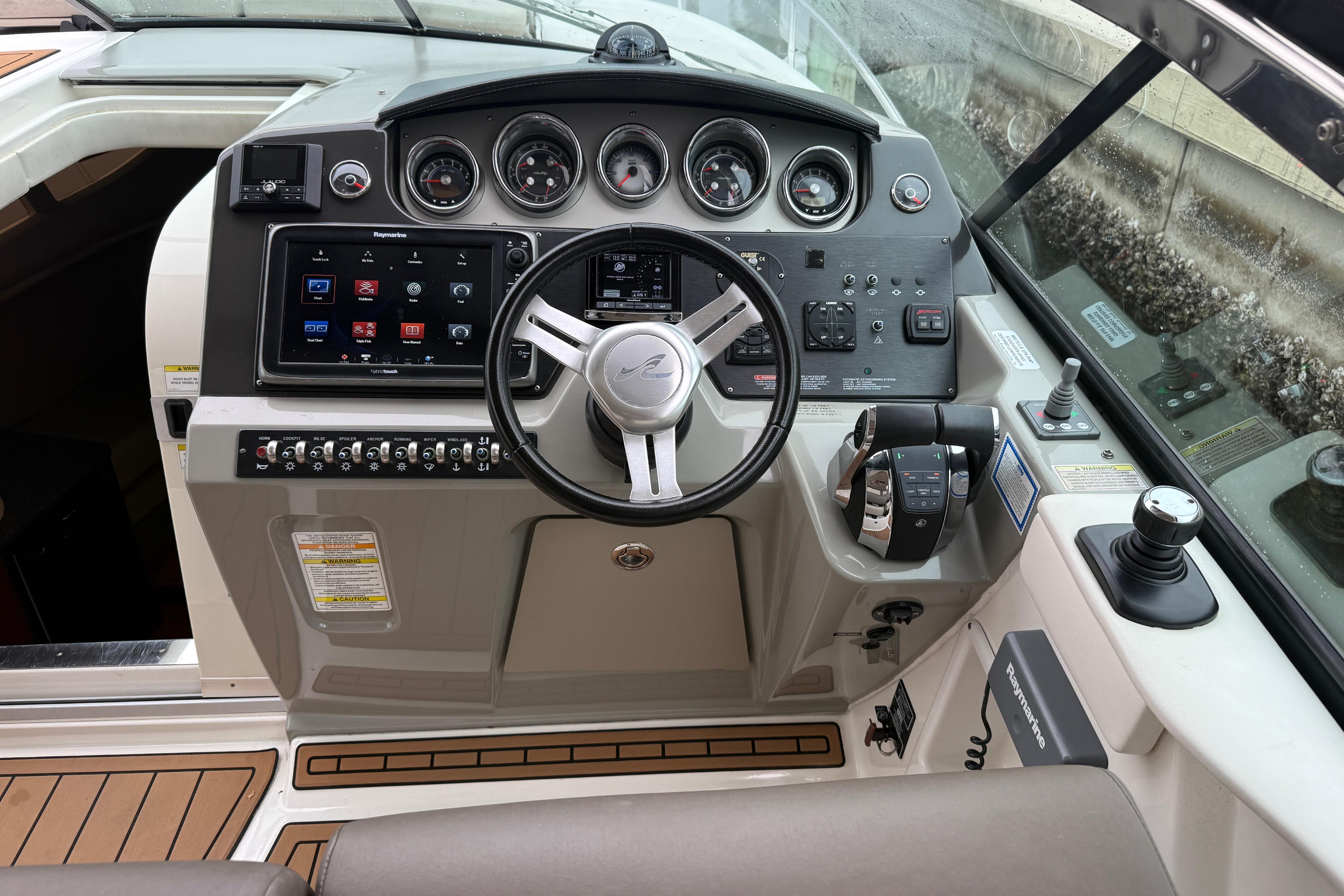 2014 Sea Ray 370 Venture helm with advanced controls and navigation system.