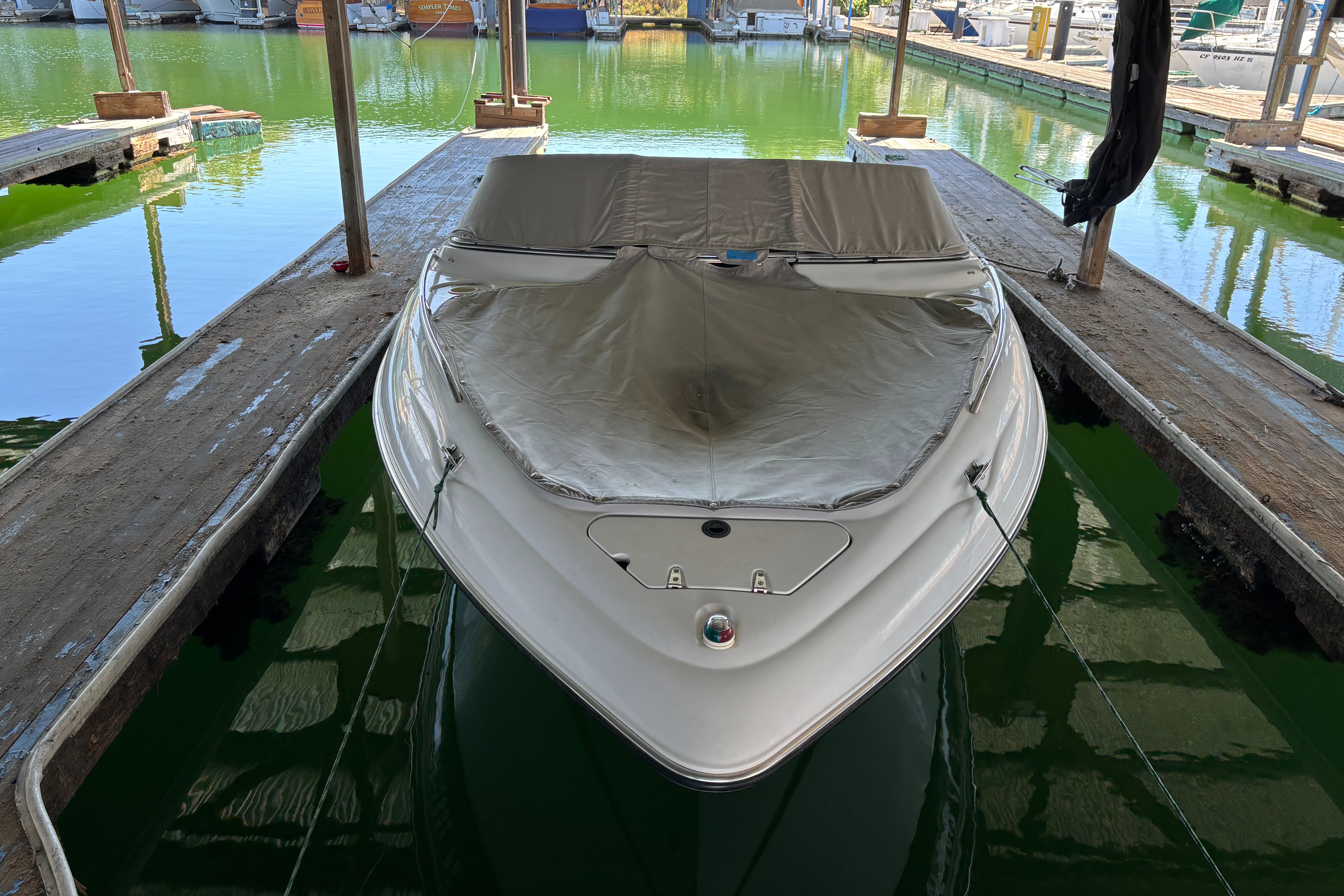 Boat in dock with cover