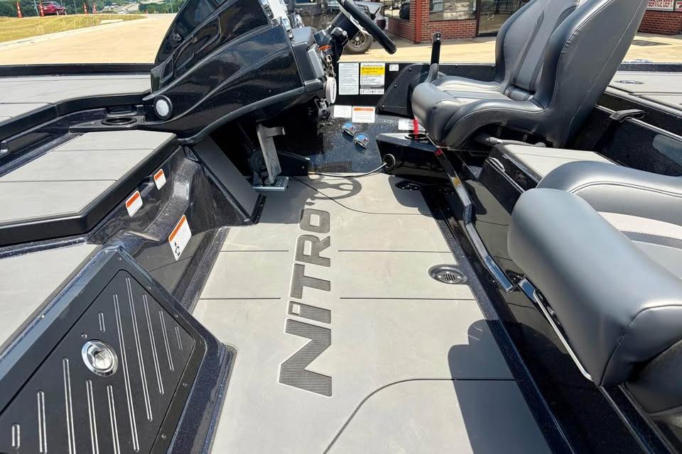 Interior of 2026 Nitro Z20 XL Pro boat with sleek seating and steering console.