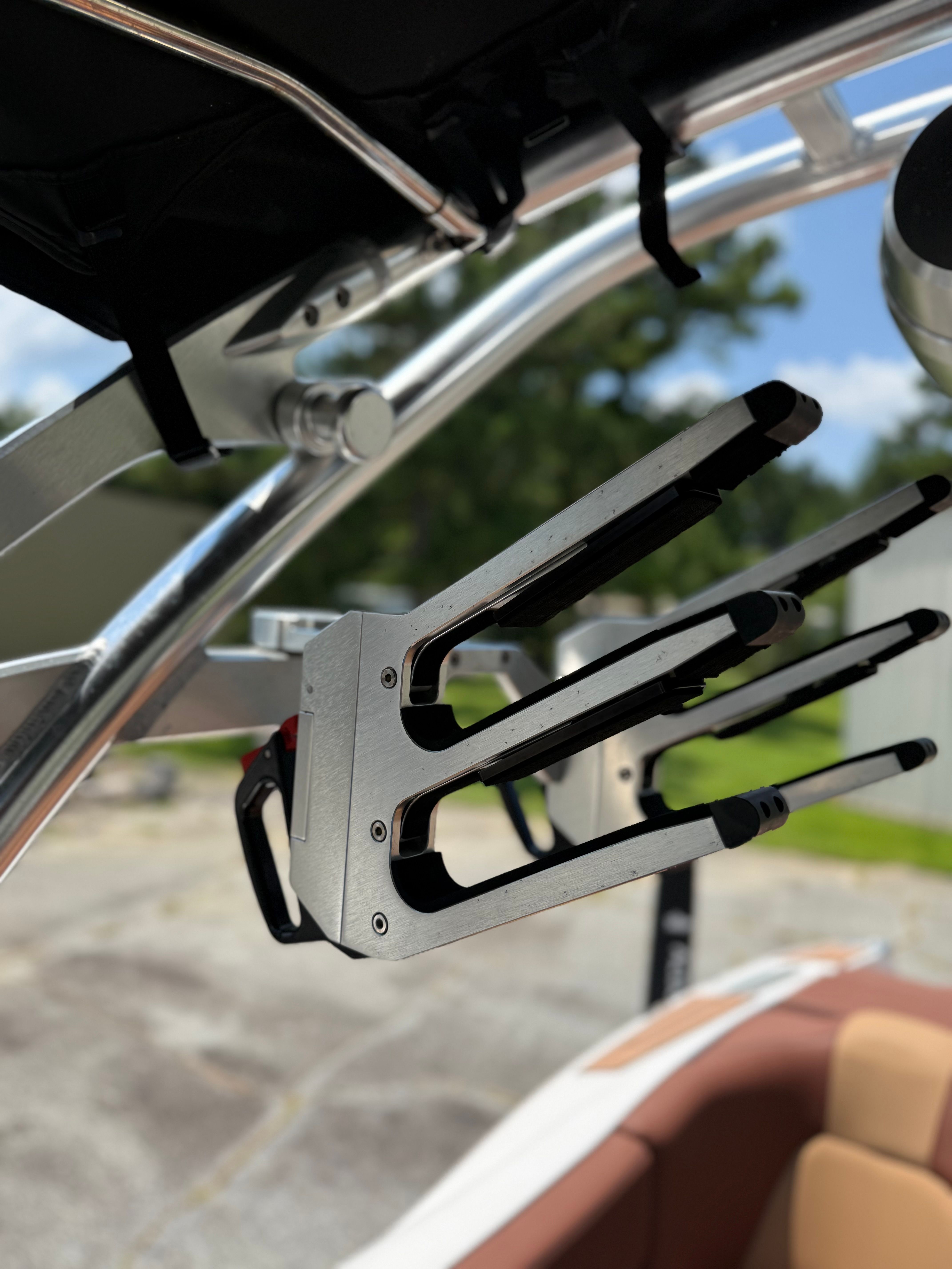 Close-up of a wakeboard rack on a MasterCraft X24 boat.