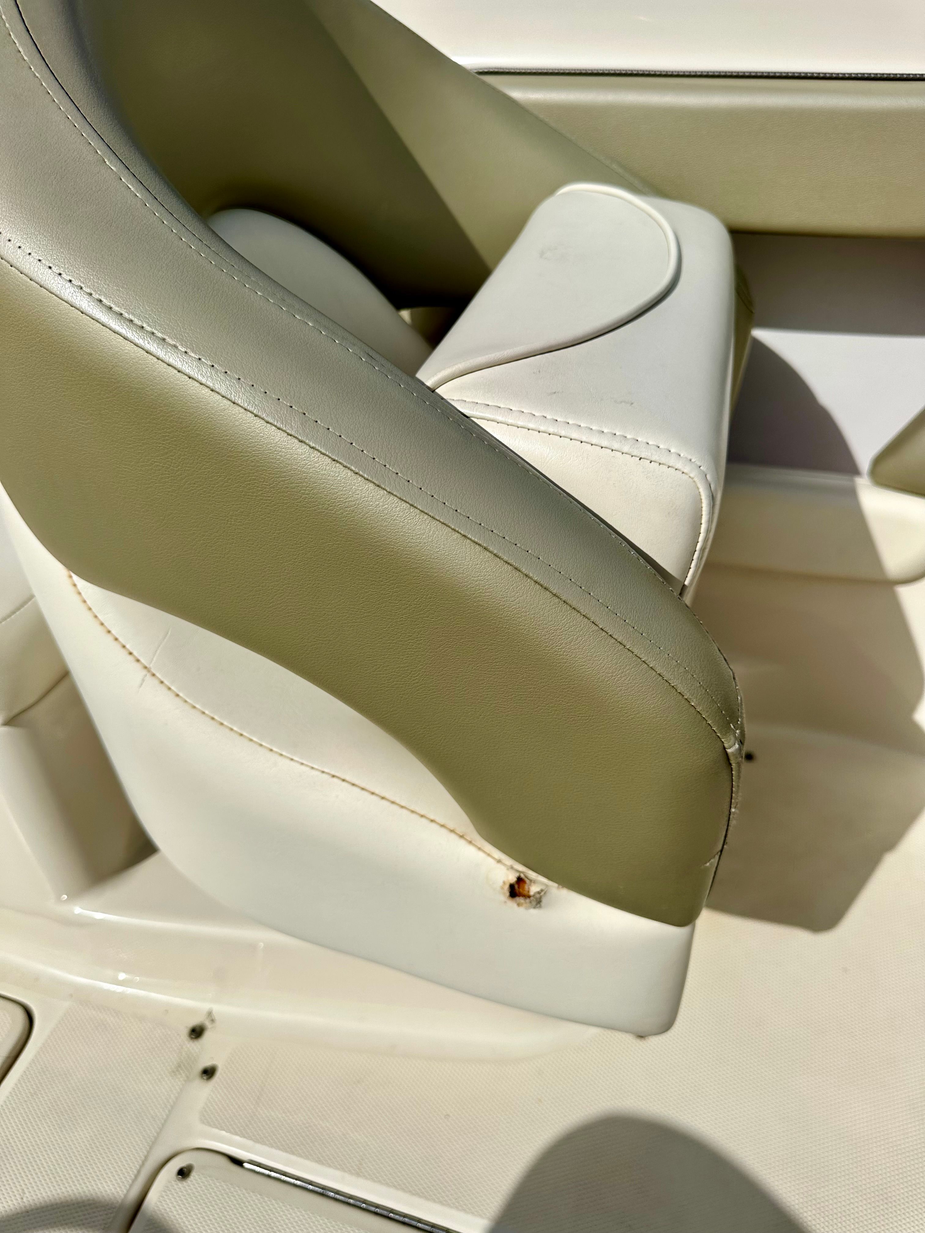 Close-up of a seat on a 2006 Sea Ray 240 Sundeck boat.