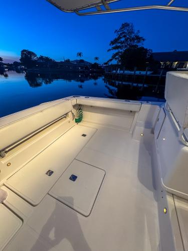 2006 Tiara Yachts 3200 Open boat deck at dusk, reflecting serene waterfront views.