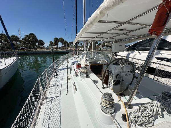 Concordia 52 sailboat, 1989 model, docked at marina with clear blue sky.