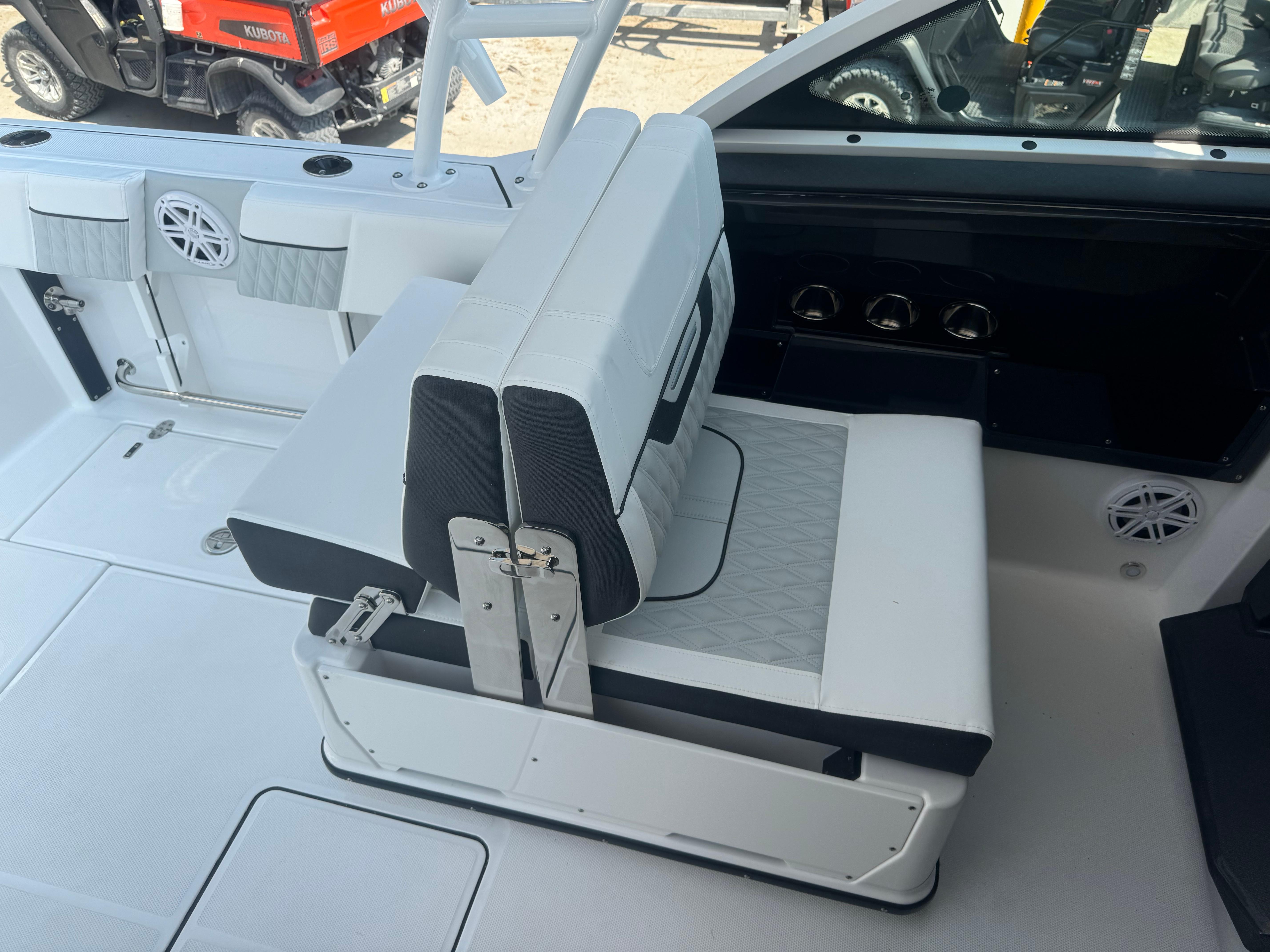 2025 Blackfin 252 DC boat interior with white and gray seating.