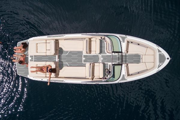 Manufacturer Provided Image: Overhead view of 2026 Regal LS6 boat with sunbathers on deck.