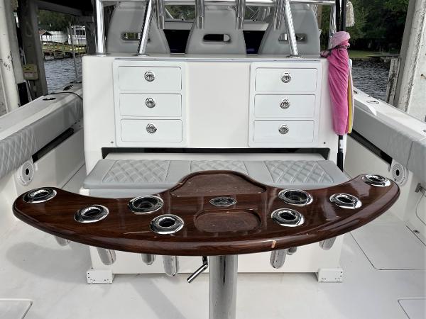 2020 Front Runner 39 Center Console boat interior with rod holders and storage drawers.