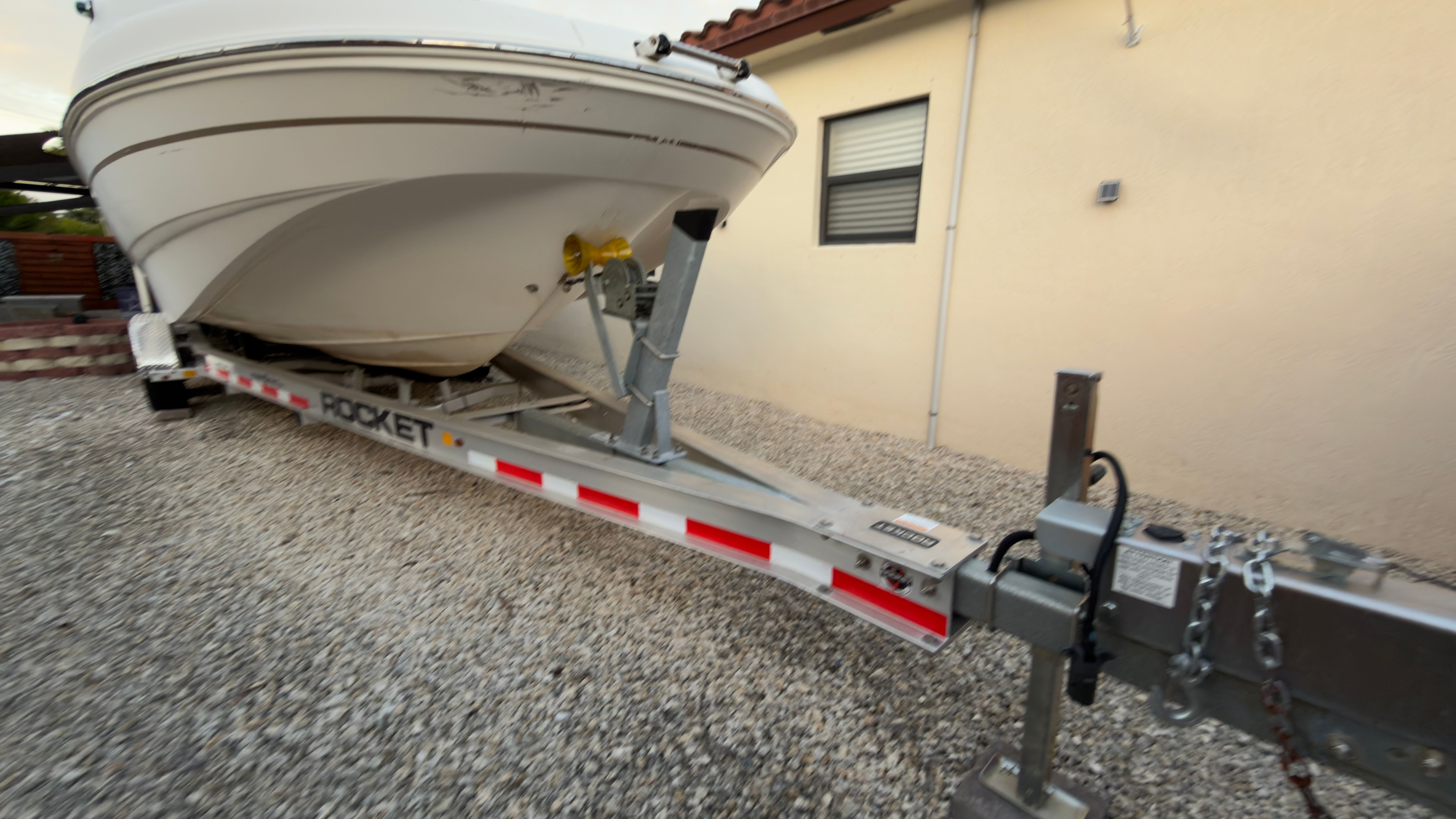 2003 Chaparral 263 Sunesta Deckboat on a trailer.