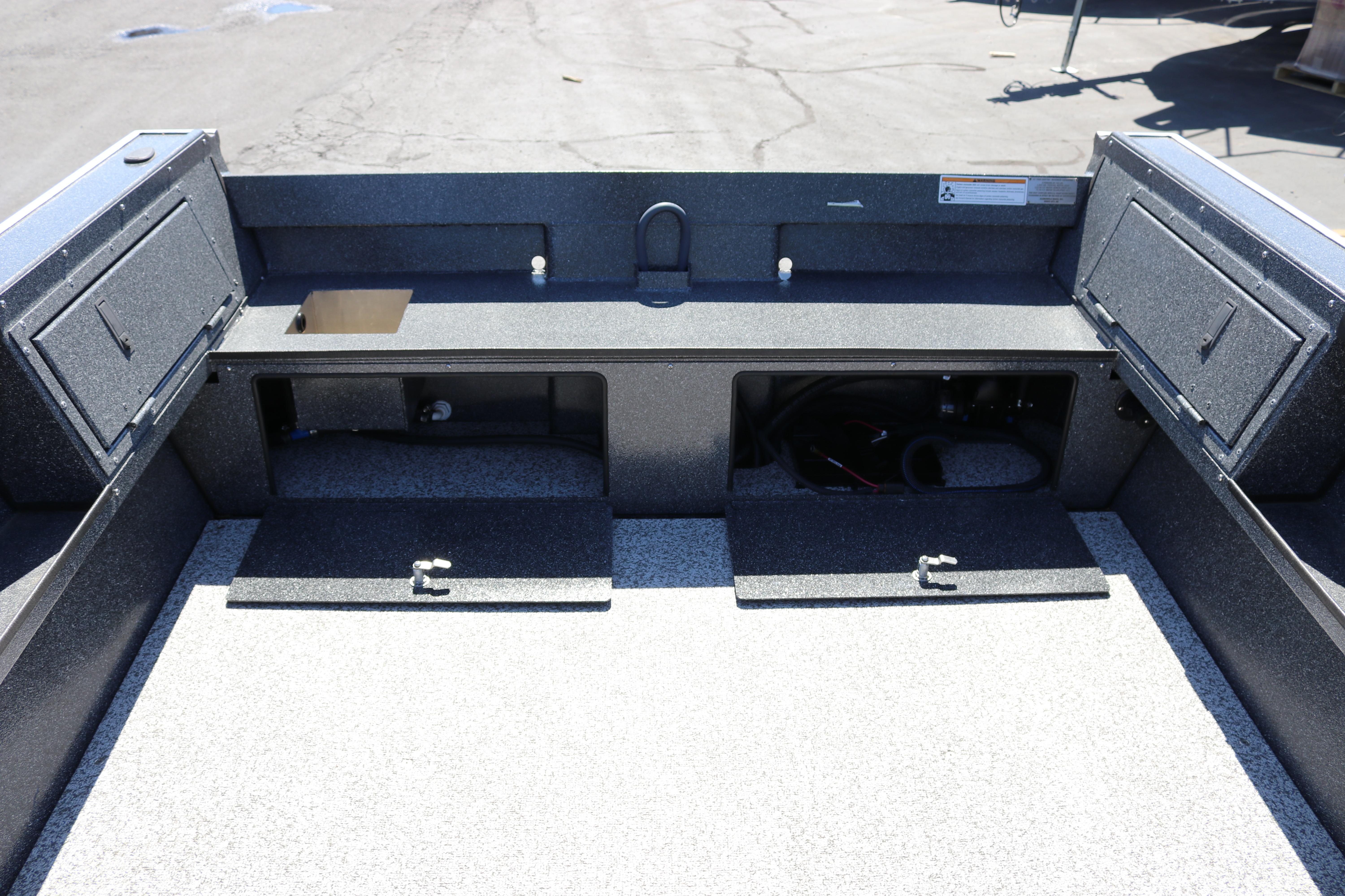 2025 Alumaweld Free Drifter 20 boat interior with storage compartments and durable flooring.