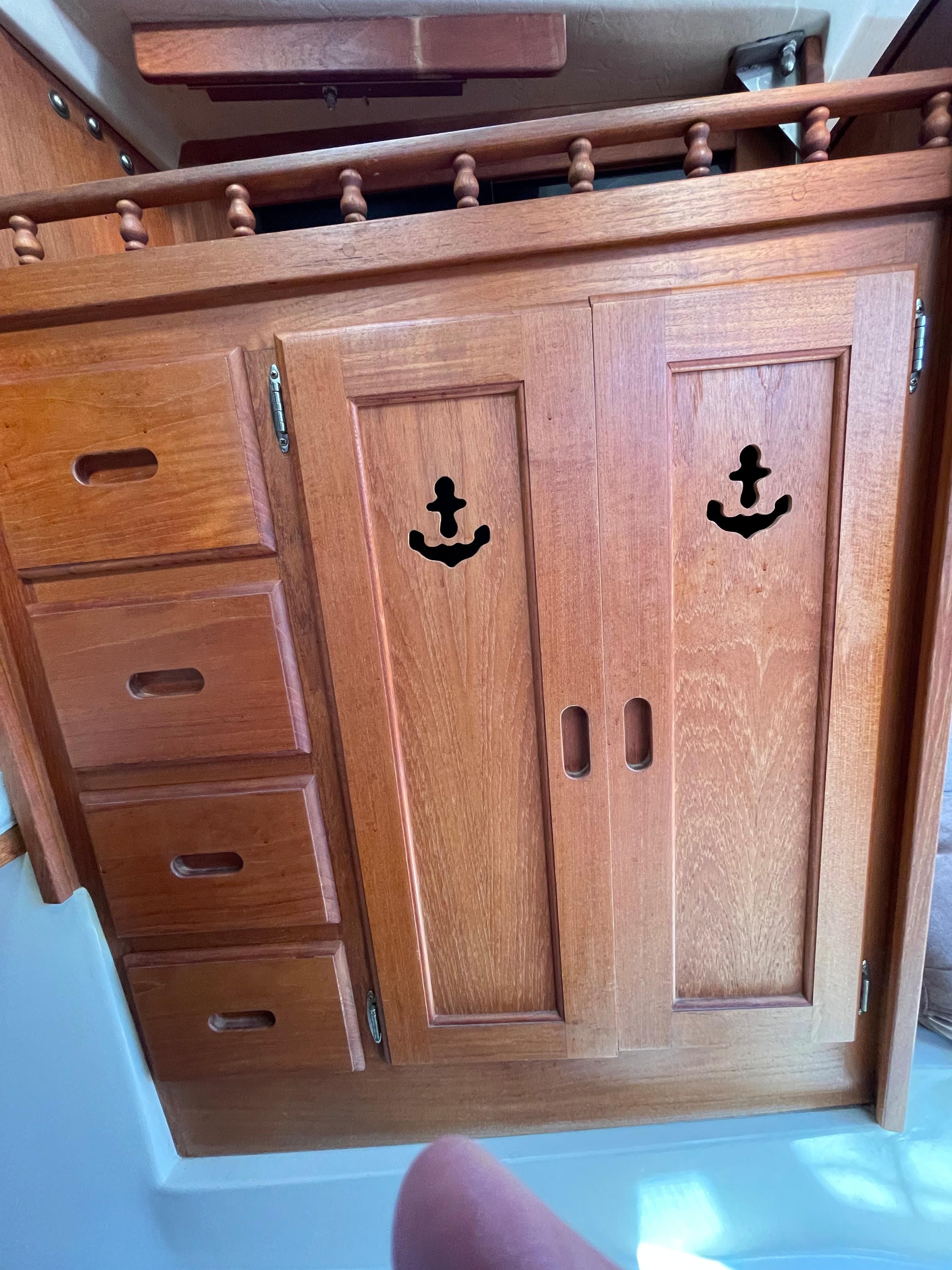 Wooden cabinet inside a 1984 Catalina 30 yacht.